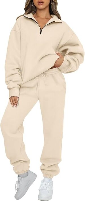 The **AUTOMET Women's 2 Piece Sweatsuit Set** is the perfect blend of comfort and style, designed for women who want to feel both relaxed and put-together. This chic set features a **long sleeve half-zip sweatshirt** that offers a cozy yet breathable fit, making it ideal for all seasons. The half-zip neckline provides versatility, allowing you to adjust your style from a laid-back look to a more sporty vibe. Paired with **high-waisted jogger sweatpants**, this outfit gives a flattering, relaxed silhouette with an adjustable drawstring waistband for a customized fit. The joggers are equipped with convenient side pockets, perfect for storing small essentials on the go. Made from a soft and stretchy fabric, this set provides superior comfort, whether you're lounging at home, running errands, or hitting the gym. Available in a variety of colors, this matching set is easy to style and can be dressed up or down for any occasion. It's the ultimate go-to for effortless everyday wear!